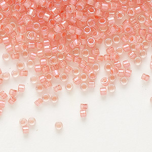 Seed bead, Delica&reg;, glass, translucent coral-lined luster crystal clear, (DB0070), #11 round. Sold per 7.5-gram pkg.