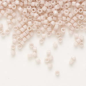 Seed bead, Delica&reg;, glass, opaque enameled pink champagne, (DB1495), #11 round. Sold per 7.5-gram pkg.