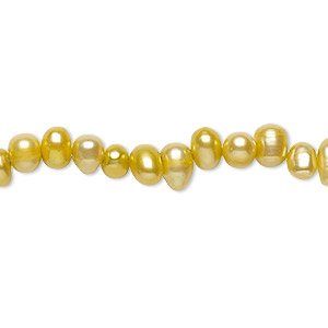 Pearl, cultured freshwater (dyed), gold, 7x5mm-8x6mm top-drilled rice, D grade, Mohs hardness 2-1/2 to 4. Sold per 15-inch strand.