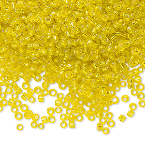 Seed bead, vintage glass, silver-lined opaque yellow, #9 round. Sold per 100-gram pkg.