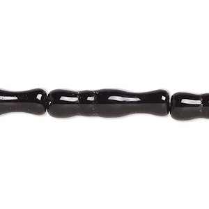 Bead, glass, opaque black, 25x6mm-26x7mm textured round tube. Sold per 15-inch strand.