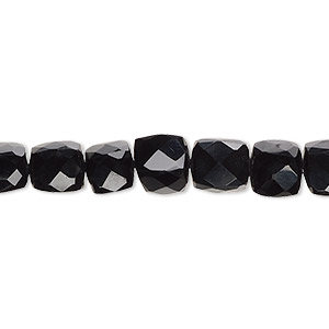 Bead, black onyx (dyed), 7-8mm hand-cut faceted cube with 0.4-1.4mm hole, B grade, Mohs hardness 6-1/2 to 7. Sold per 10-inch strand, approximately 30 beads.