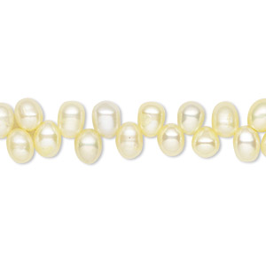 Pearl, cultured freshwater (dyed), yellow, 5x4mm-7x5mm top-drilled rice with 0.4-0.5mm hole, D grade, Mohs hardness 2-1/2 to 4. Sold per 15-inch strand.