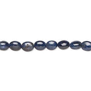 Bead, blue sapphire (dyed), dark, 5x4mm-7x5mm hand-cut puffed oval, C grade, Mohs hardness 9. Sold per 15-inch strand.
