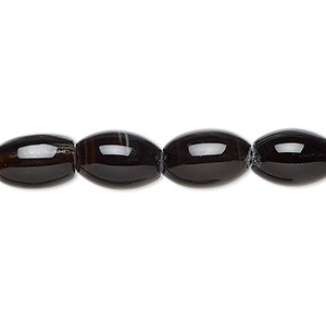 Bead, black agate (dyed), 10x8mm-12x9mm barrel, C grade, Mohs hardness 6-1/2 to 7. Sold per 15-inch strand, approximately 35 beads.